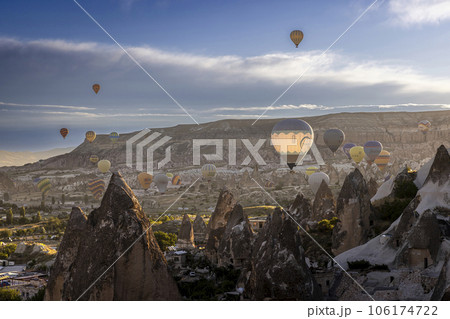 hot air balloons fly over the city of goreme at sunrise hot air balloons fly over the city of goreme at sunrise 106174722