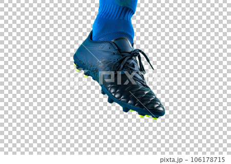 Isolated football  player plays with soccerball in a match 106178715