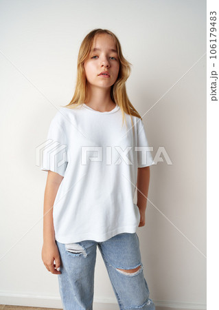 Portrait of young beautiful cute teen girl posing at camera Portrait of young beautiful cute teen girl posing at camera 106179483