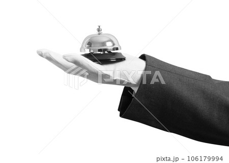 Waiter holds a bell in hand. Concept of first class service in your business 106179994