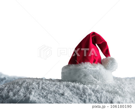 Christmas background of  santa claus hat over the snow 106180190