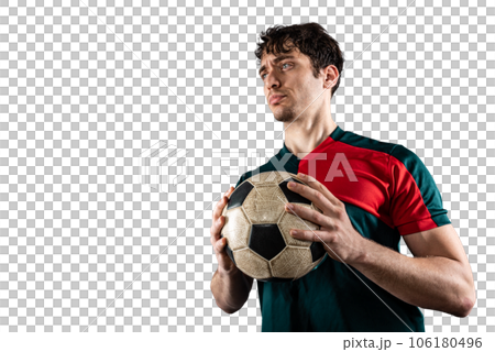 Football player holds the ball and he is ready to play with soccer 106180496