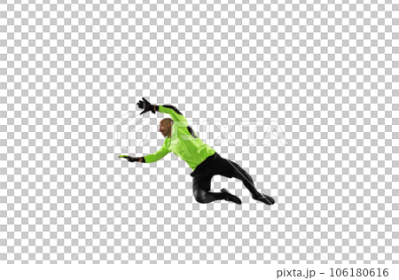 Soccer goalkeeper jumps to defend his team during a football game Soccer goalkeeper jumps to defend his team during a football game 106180616