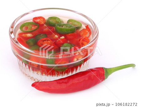 Chili peppers in a transparent bowl 106182272