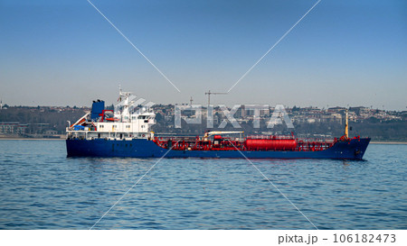Big gas tanker or cargo ship in the sea harbour on sunny day 106182473