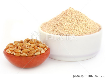 Fresh brown flour with wheat 106182975