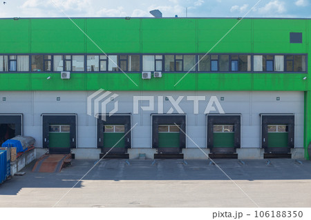 Row of loading docks with shutter doors. Row of loading docks with shutter doors. 106188350