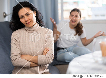Two women having quarrel at home 106190475
