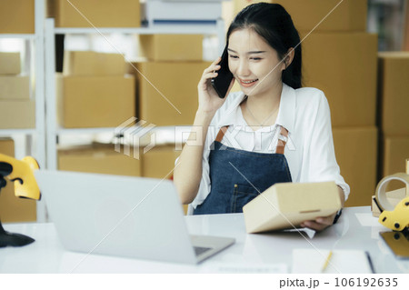 Small business owners, startup and e-commerce concept. Small business owners, startup and e-commerce concept. 106192635