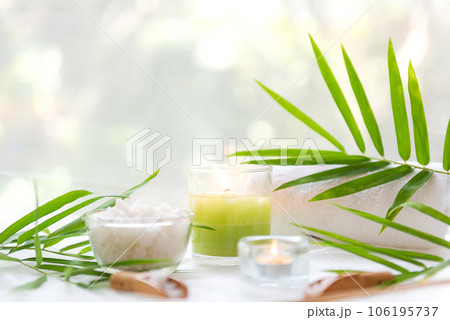 Thai Spa Treatments aroma therapy salt and  sugar scrub massage with bamboo leaves with candle,  106195737