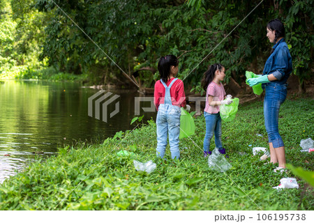 Group student Charity and recycle plastic for environment. People asia girl and boy collecting garbage Group student Charity and recycle plastic for environment. People asia girl and boy collecting garbage 106195738