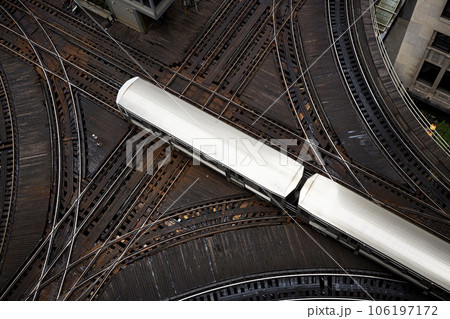 Train on elevated railroad track . Train on elevated railroad track . 106197172