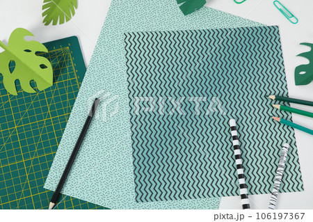 Patchwork accessories concept on white background, cutting mat Patchwork accessories concept on white background, cutting mat 106197367