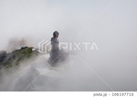 Buddha statue statue on top of Fansipan mountain peak.. Buddha statue statue on top of Fansipan mountain peak.. 106197718