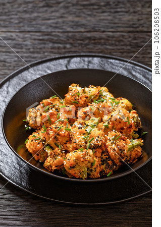 bang bang broccoli bites in bowl, top view 106208503