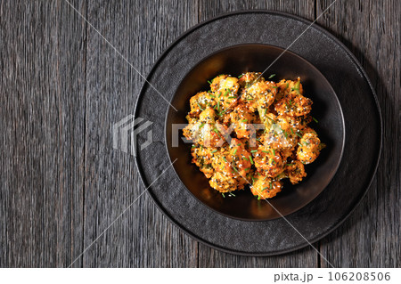 bang bang broccoli bites in bowl, top view bang bang broccoli bites in bowl, top view 106208506