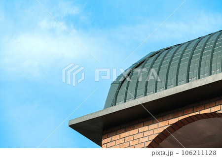 Green roof of the architecture made of steel and brick Green roof of the architecture made of steel and brick 106211128