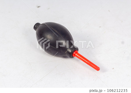 A Manual Hand Air Blower isolated on White Background, This blower is generally used to clean dust from the DSLR or Mirrorless cameras and, Lenses. A Manual Hand Air Blower isolated on White Background, This blower is generally used to clean dust from the DSLR or Mirrorless cameras and, Lenses. 106212235