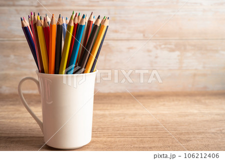 Colorful pencils on wooden background with copy space, learning university education concept. 106212406