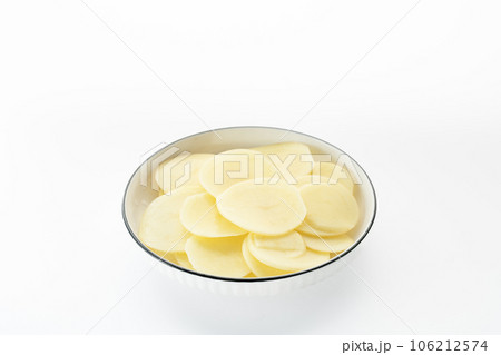 Potato chips placed on a white background. Potato chips placed on a white background. 106212574