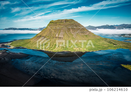 Kirkjufell mountain with foggy by Atlantic ocean in summer at Snaefellsnes peninsula Kirkjufell mountain with foggy by Atlantic ocean in summer at Snaefellsnes peninsula 106214610