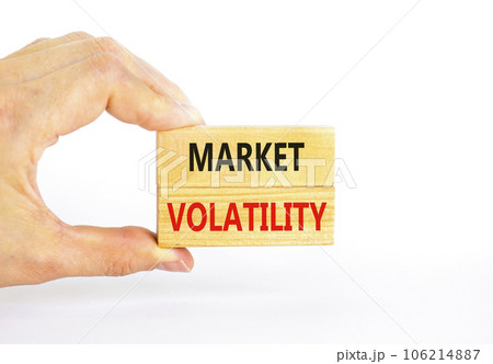 Market volatility symbol. Concept words Market volatility on beautiful wooden blocks. Beautiful white table white background. Businessman hand. Business market volatility concept. Copy space. Market volatility symbol. Concept words Market volatility on beautiful wooden blocks. Beautiful white table white background. Businessman hand. Business market volatility concept. Copy space. 106214887