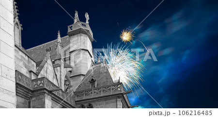 Celebratory fireworks over the Great gothic church of Saint Germain l Auxerrois, Paris, France 106216485