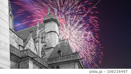 Celebratory fireworks over the Great gothic church of Saint Germain l Auxerrois, Paris, France 106216497