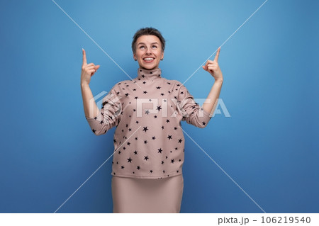positive inspired young career woman with gray streaked hair dressed in a skirt and blouse positive inspired young career woman with gray streaked hair dressed in a skirt and blouse 106219540