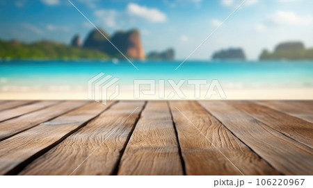 The empty wooden table top with blur background of Thailand beach. Exuberant. The empty wooden table top with blur background of Thailand beach. Exuberant. 106220967