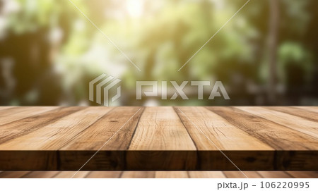 The empty wooden table top with blur background. Exuberant. The empty wooden table top with blur background. Exuberant. 106220995
