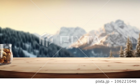 The empty wooden table top with blur background of Alpine with snow capped. Exuberant. The empty wooden table top with blur background of Alpine with snow capped. Exuberant. 106221046