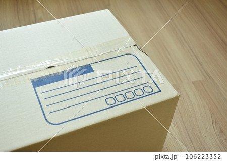 brown post box packaging put on wood floor brown post box packaging put on wood floor 106223352