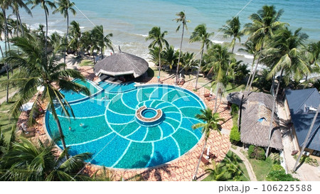 Aerial view of Swimming pool and the beach in the Phan Thiet resort, Binh Thuan Province, Viet Nam Aerial view of Swimming pool and the beach in the Phan Thiet resort, Binh Thuan Province, Viet Nam 106225588