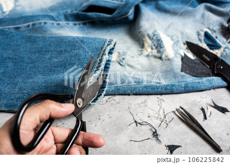 making distressed jeans making distressed jeans 106225842