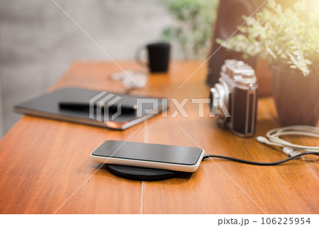 charging the smartphone charging the smartphone 106225954