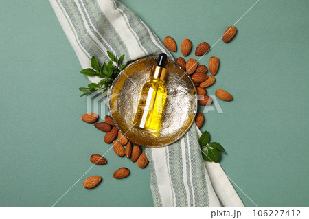 Skin care and body care concept - almonds, almond oil Skin care and body care concept - almonds, almond oil 106227412