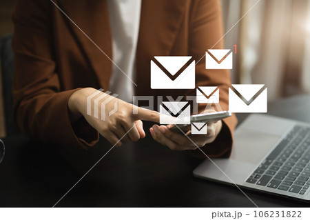Email notification concept, Female use smartphone and laptop receive message alert in the mailbox. 106231822