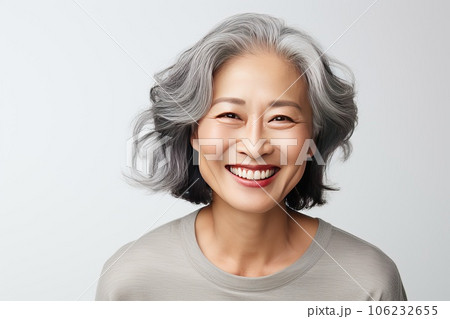 Close-up portrait of a stylish beautiful Asian woman in her 50s. Close-up portrait of a stylish beautiful Asian woman in her 50s. 106232655