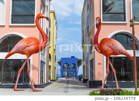 New touristic district Vega City Nha Trang, architecture and flamingo sculptures in European and Caribbean style 106234779
