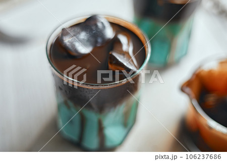 Signature iced chocolate mint drink in glass Signature iced chocolate mint drink in glass 106237686
