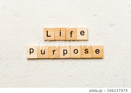 life purpose word written on wood block. life purpose text on cement table for your desing, concept 106237874