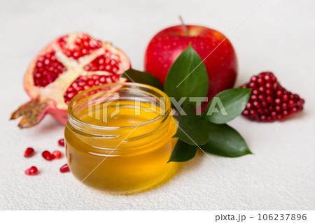Flat lay composition with symbols jewish Rosh Hashanah holiday attributes on colored background, Rosh hashanah concept. New Year holiday Traditional. Top view with copy space Flat lay composition with symbols jewish Rosh Hashanah holiday attributes on colored background, Rosh hashanah concept. New Year holiday Traditional. Top view with copy space 106237896