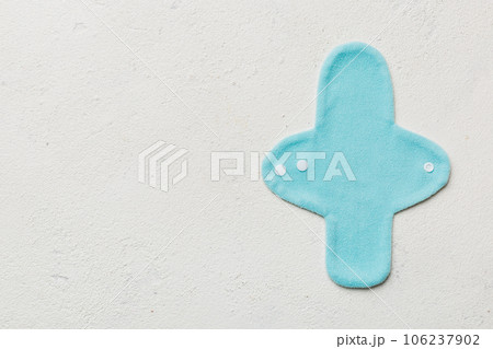 Eco-friendly reusable fabric women's pads. set of colorful bright reusable menstrual pads. zero waste woman periods concept top view with copy space 106237902