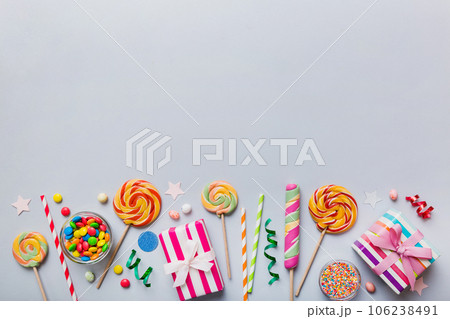Collection of birthday party objects with gift box. Valentines day gift box. Top view flat lay with copy space Collection of birthday party objects with gift box. Valentines day gift box. Top view flat lay with copy space 106238491