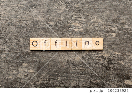 offline word written on wood block. offline text on table, concept offline word written on wood block. offline text on table, concept 106238922