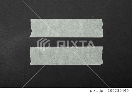 equal sign close up of an adhesive tape equal sign close up of an adhesive tape 106239440