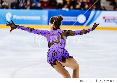 close-up girl figure skater in purple dress, figure skating single 106239487