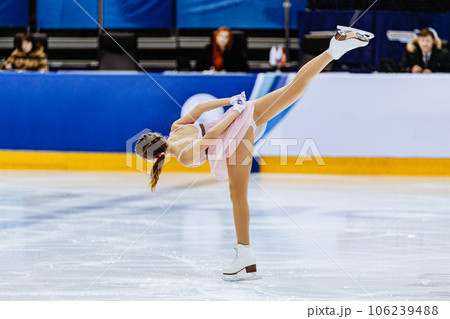 girl one leg skating in ice championship, figure skating single 106239488