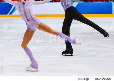 figure skating dancing couple in ice competitiveの写真素材